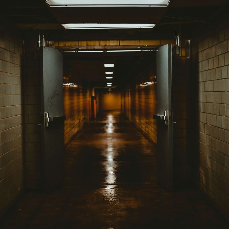 Long, dark hallway inside a school